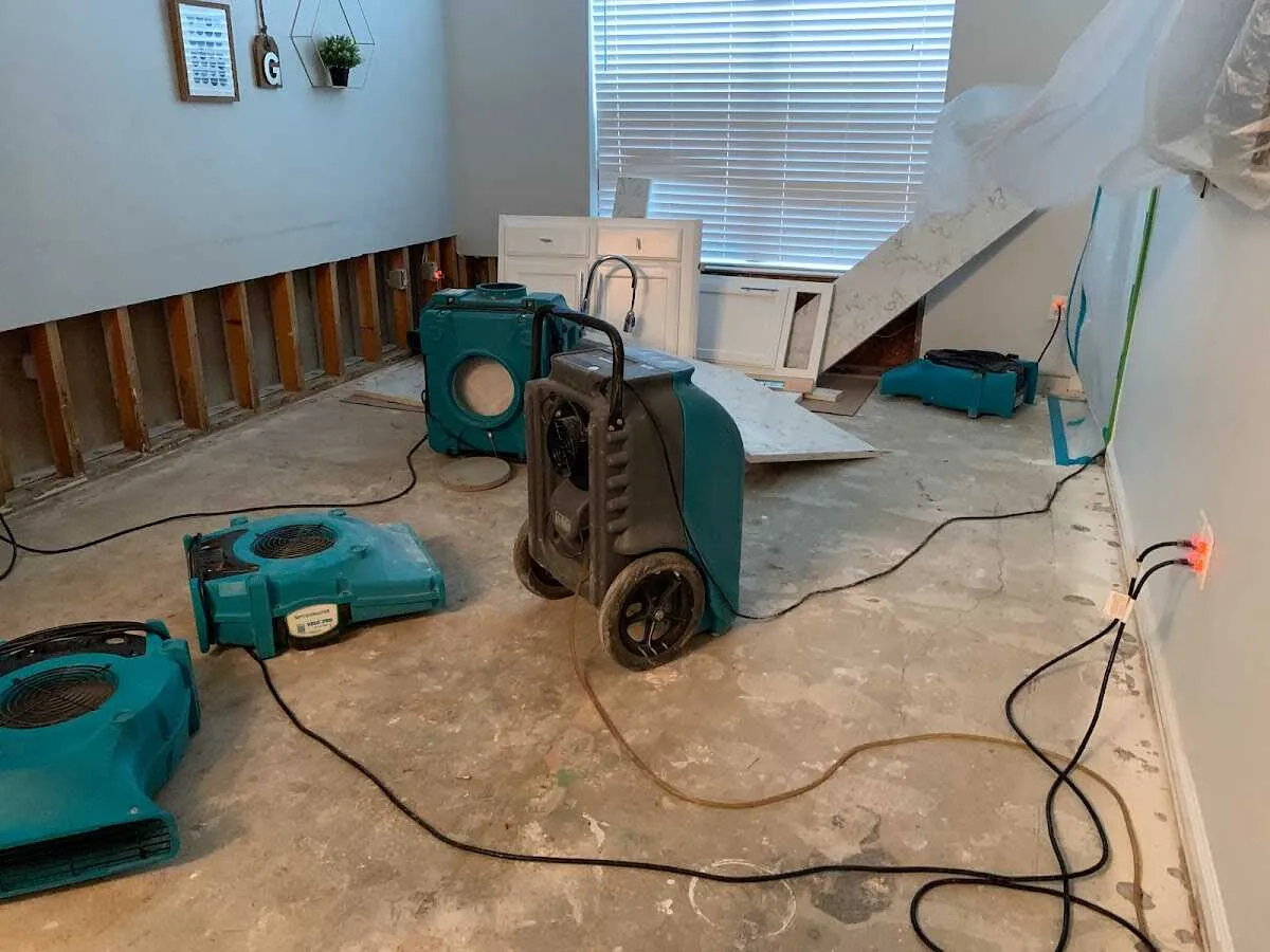 Dehumidifier in flood-cut room for Water Damage Restoration in Woolwich